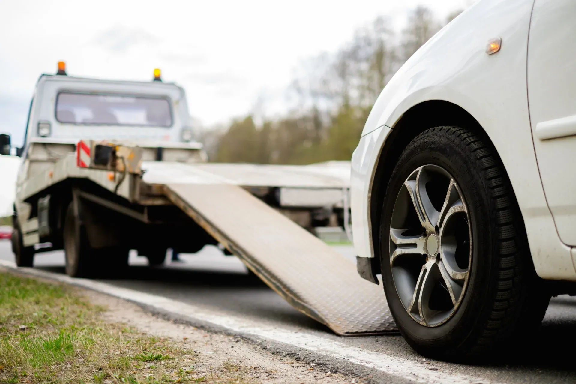 White car prepared for towing service assistance